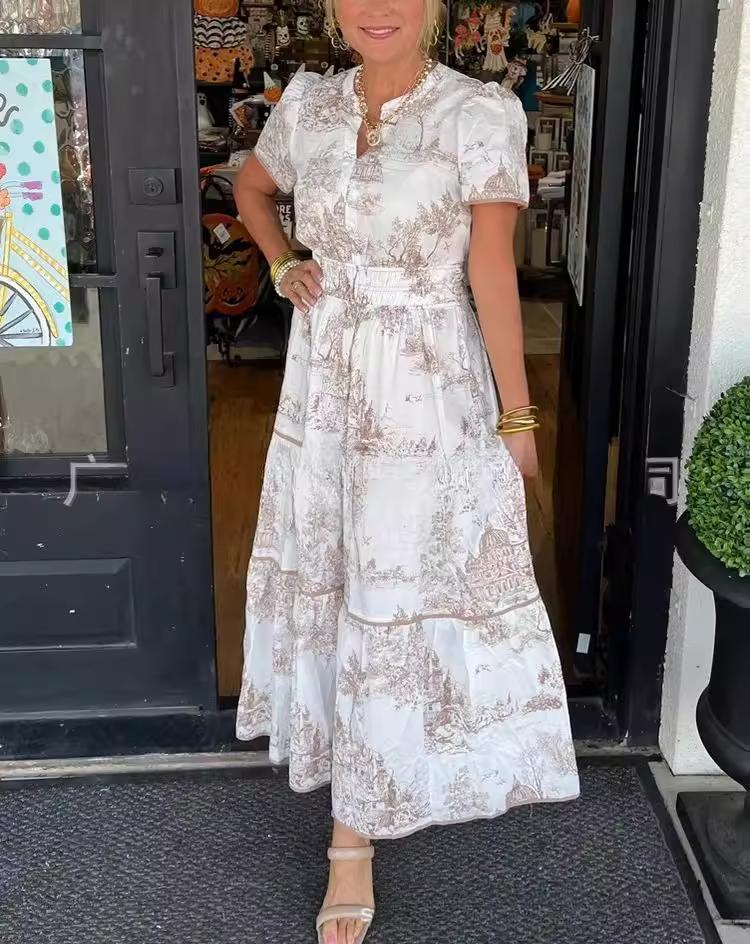 

Женское белое платье макси с цветочным принтом, рукавами-буфами и деталью в виде завязки на талии S светло-коричневого