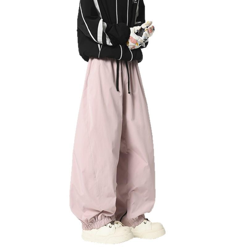 Unisex Waterproof & Windproof Ski Pants for Extreme Cold, Ideal for Northeast China Winters, Mountaineering, and Snowboarding.