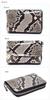 Natural Japanese-made diamond python snakeskin coin purse for men and women. Compact, small, slim, and lightweight, this mini wallet features card