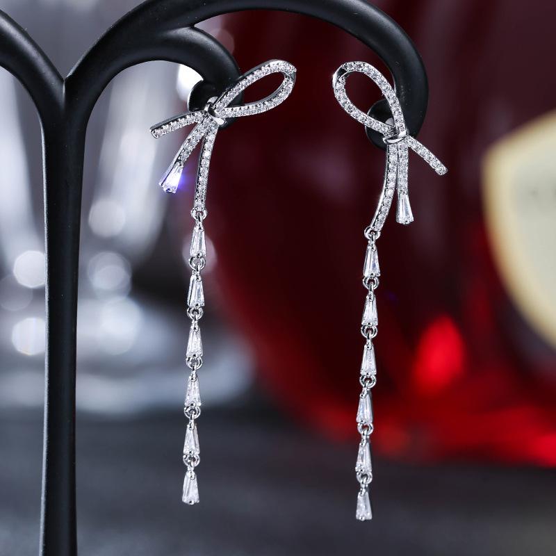 Silver Half Bow Stud Earrings with Diamond Chains - Elegant Geometric Jewelry