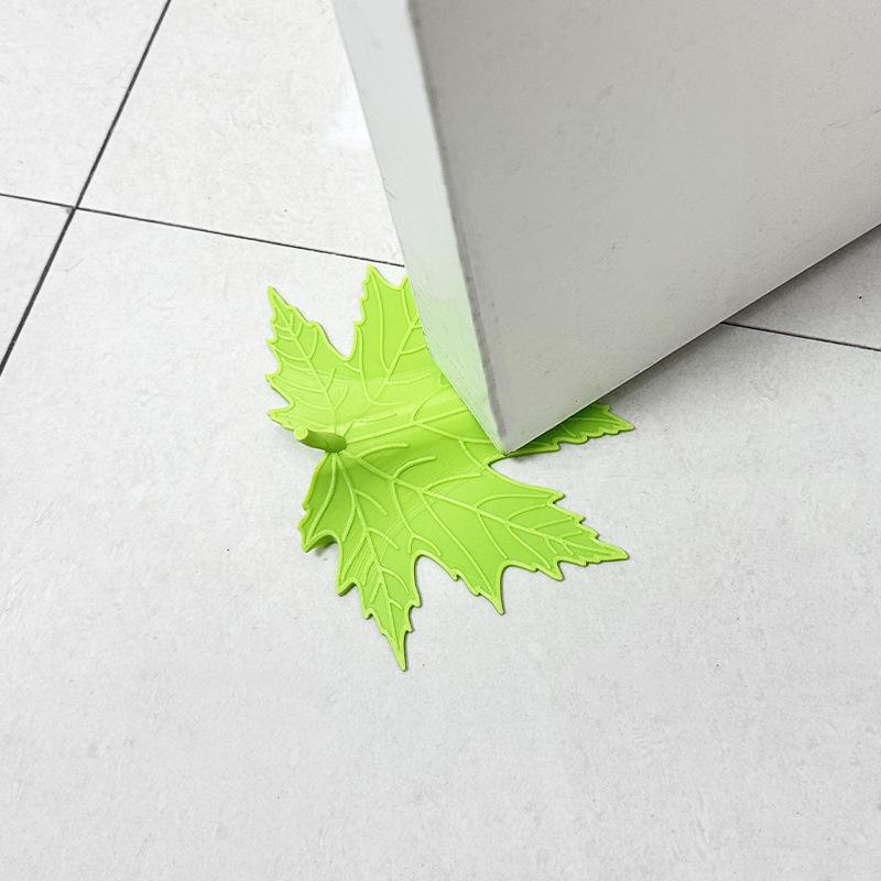 1 Stück Kleiner, niedlicher, minimalistischer Türstopper mit Blattdesign. Ein künstlerisches und praktisches Heimdesign-Werkzeug, geeignet für Türspalte von 3 mm bis 13 mm.