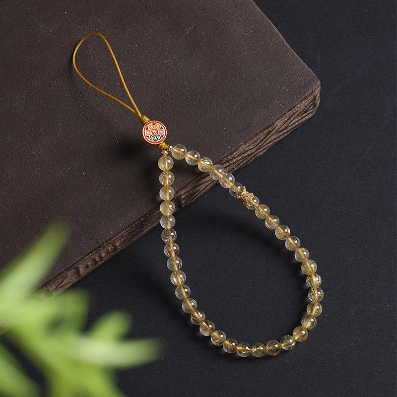 

Natural golden crystal phone lanyard for women, new exquisite phone chain pendant, short anti-loss wrist strap accessory 6mm Golden Rutilated Quar