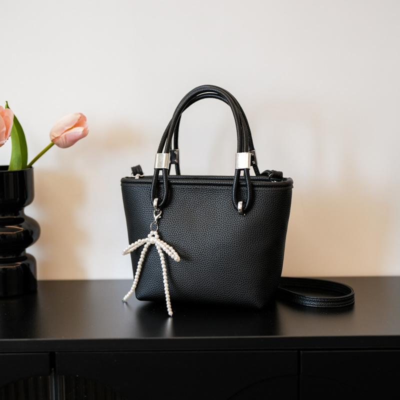 

Портативная модная сумка-ведро с бантом для женщин 2024 года, осенняя корейская версия, простая универсальная сумка через плечо, сумка-мессенджер премиум-класса чёрный