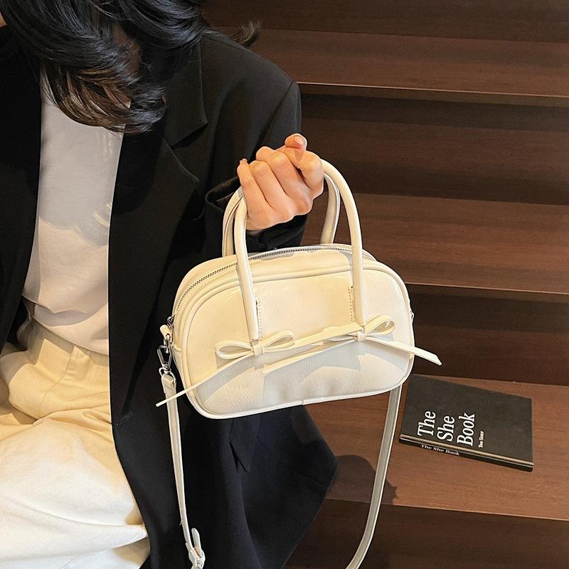 Bag 2025 new niche single bag women's bow simple casual bowling bag pillow bag hand bag