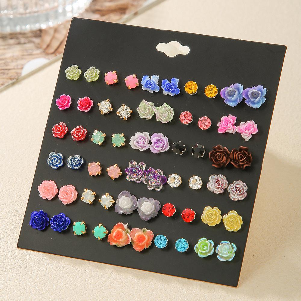 Korean version of versatile animal fruit combination set cute stud earrings female niche simple high-end rose flower earrings