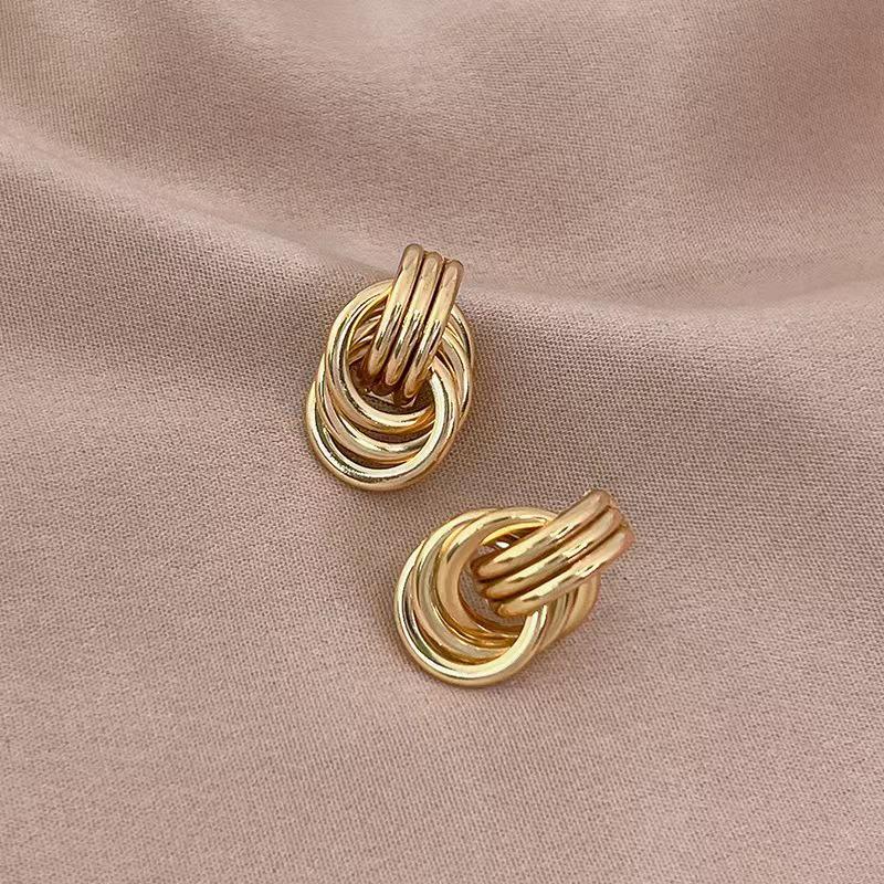 Gold-Tone Geometric Twist Earrings: Fashionable and Versatile Multi-Layer Braided Earrings for Women.