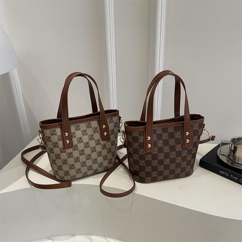 Foreign style small bucket bag women's new versatile shoulder messenger bag highend vegetable basket handbag