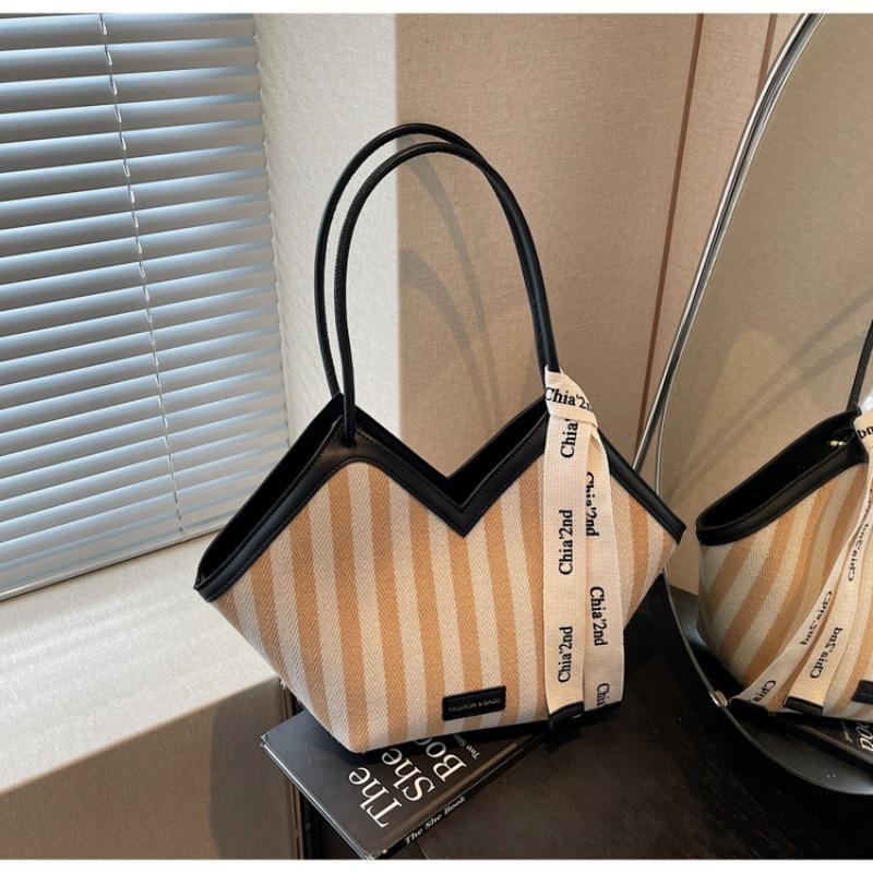 Striped canvas bag women's large-capacity new summer niche shoulder armpit bag college student class bag