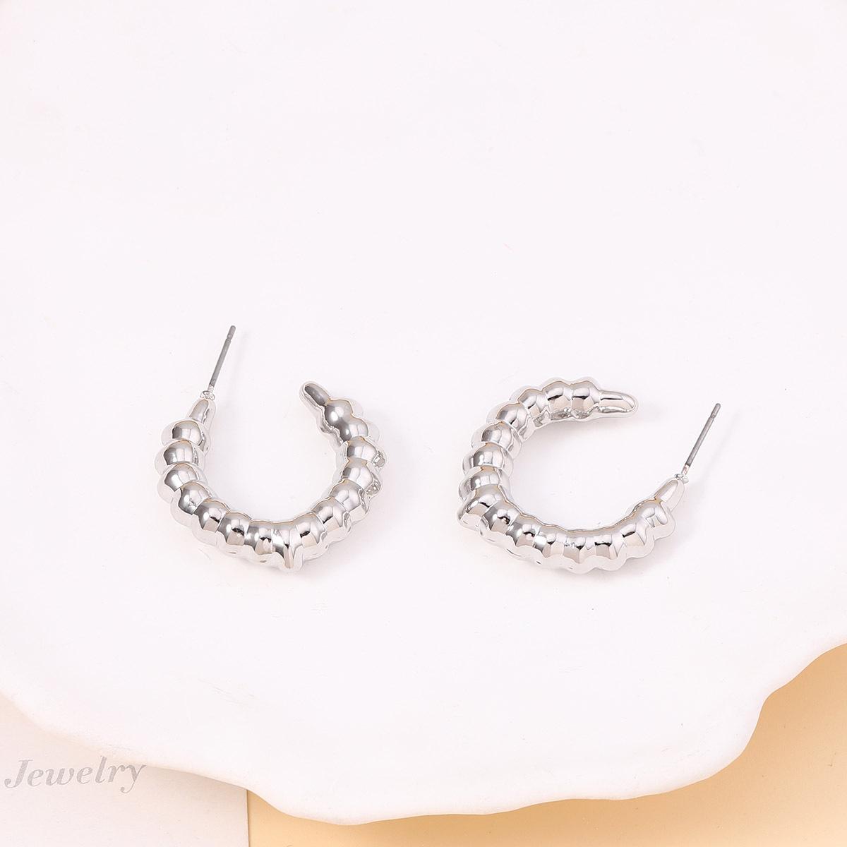 

High-end irregular texture geometric C-letter ear studs, unique basic classic and niche earrings