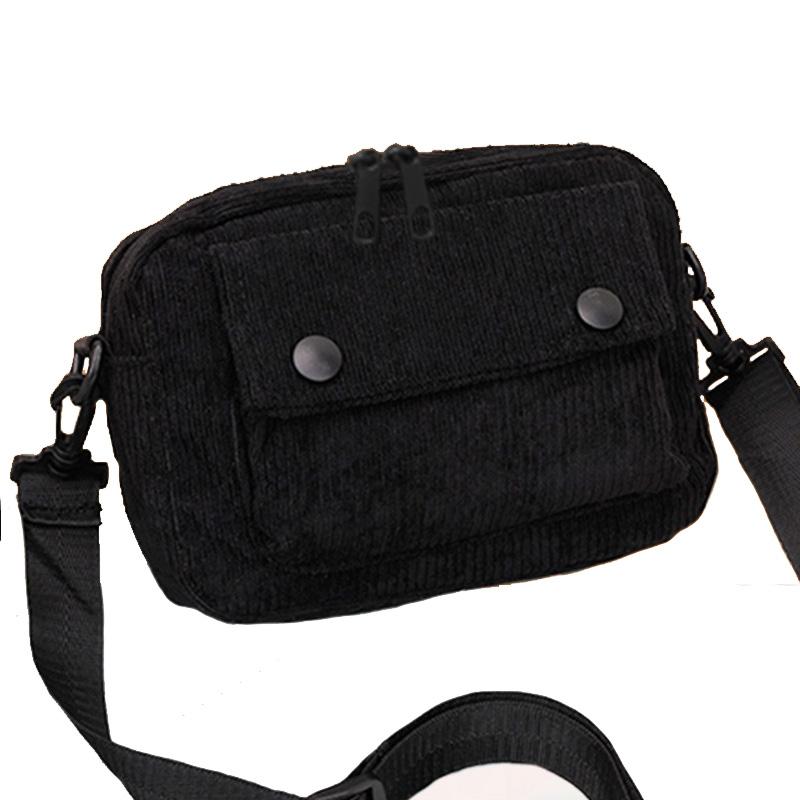 Neutral men's and women's cross-body bag with shoulder strap, made of corduroy material, with a flap design  the outside.