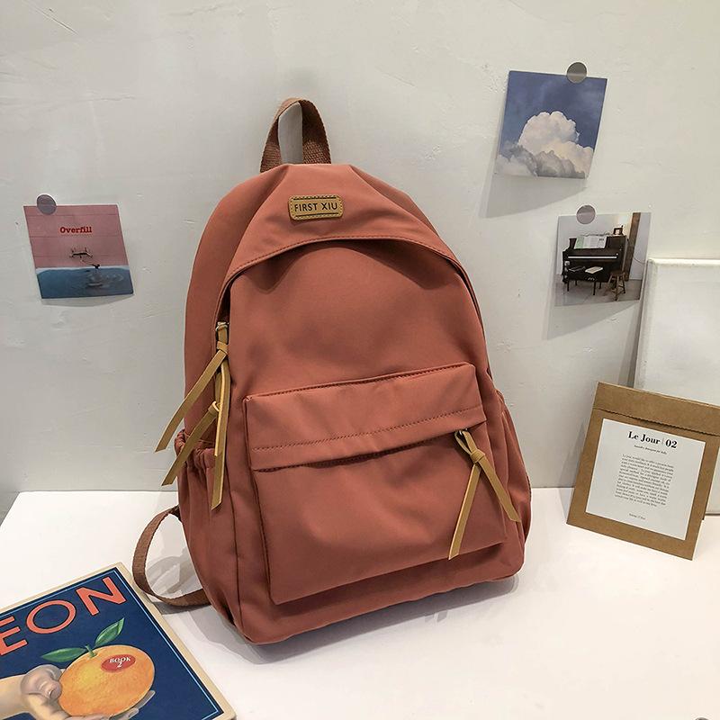 Schoolbag1010 spring new Korean style nylon solid color backpack fashion casual student couple backpack