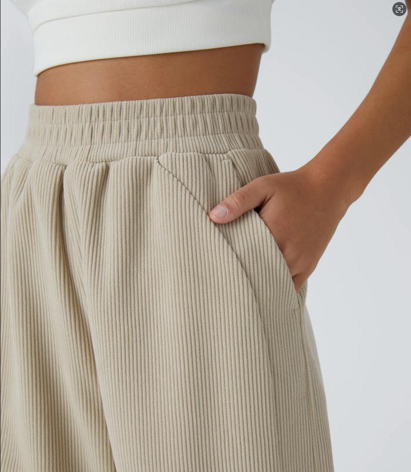 Dampantal med hög midja, raka ben och fickor i manchester