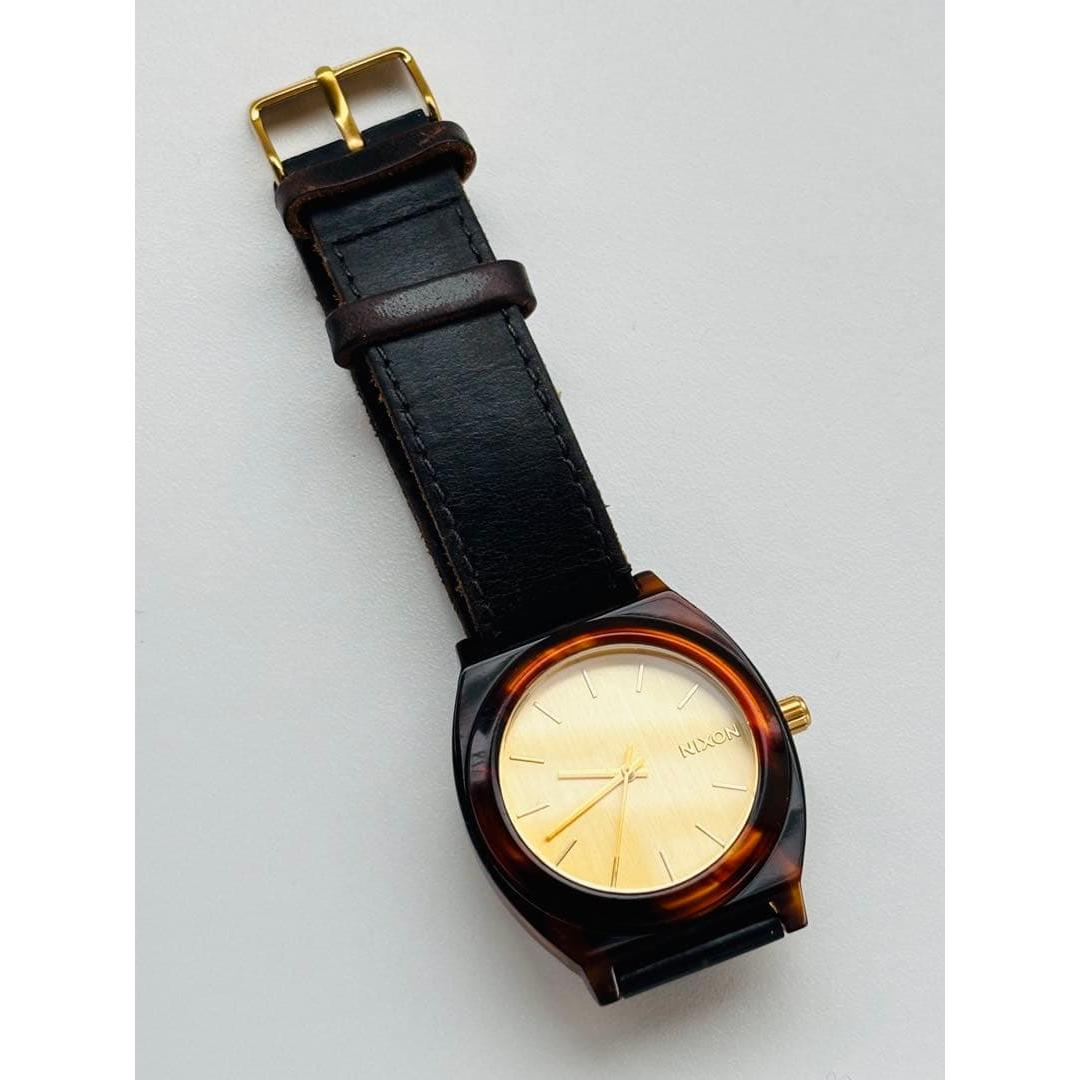 Used [New battery] NIXON TIME TELLER tortoiseshell x gold color!