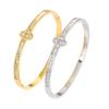Elegant Four-Leaf Clover Zircon Bracelet: Gold-Plated Titanium Steel Floral Jewelry