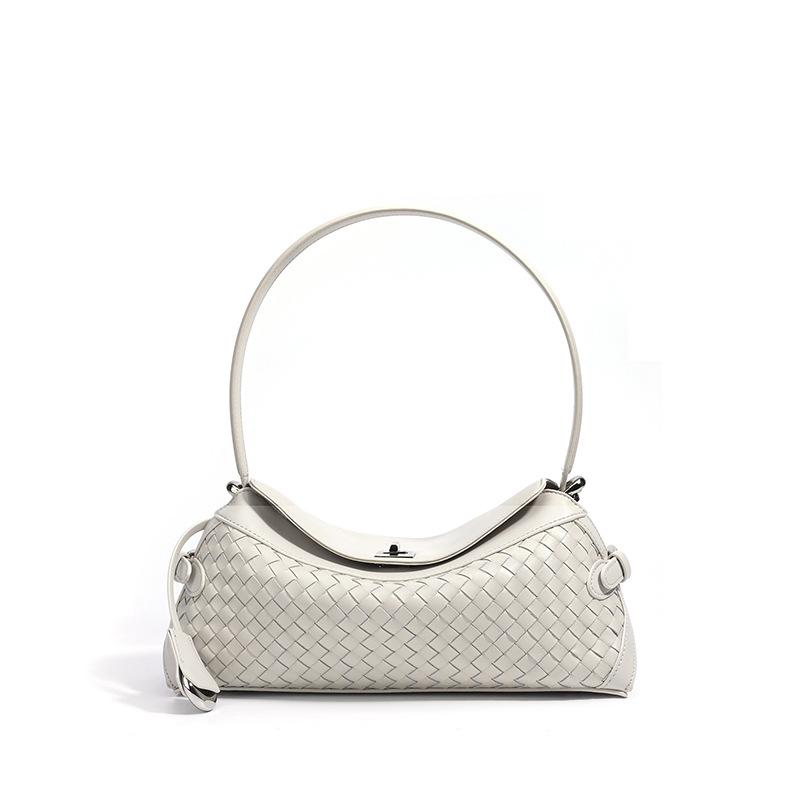 Bag women's hot-selling new retro high-end woven bag first layer cowhide commuter women's shoulder pillow bag