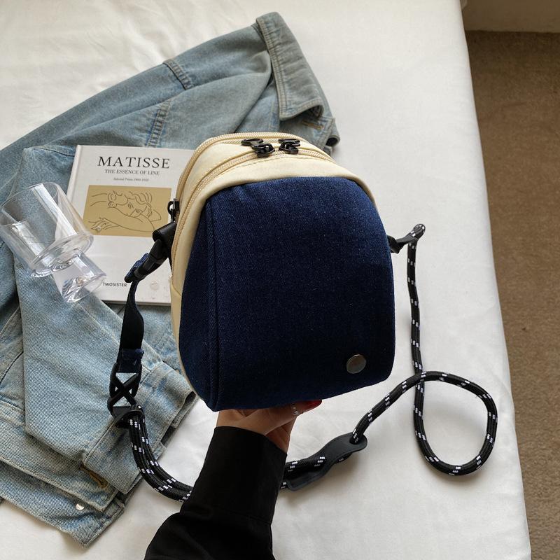 Japanese casual niche design, simple and foreign, personality, portable small satchel, fashion travel, fashion small round bag girl