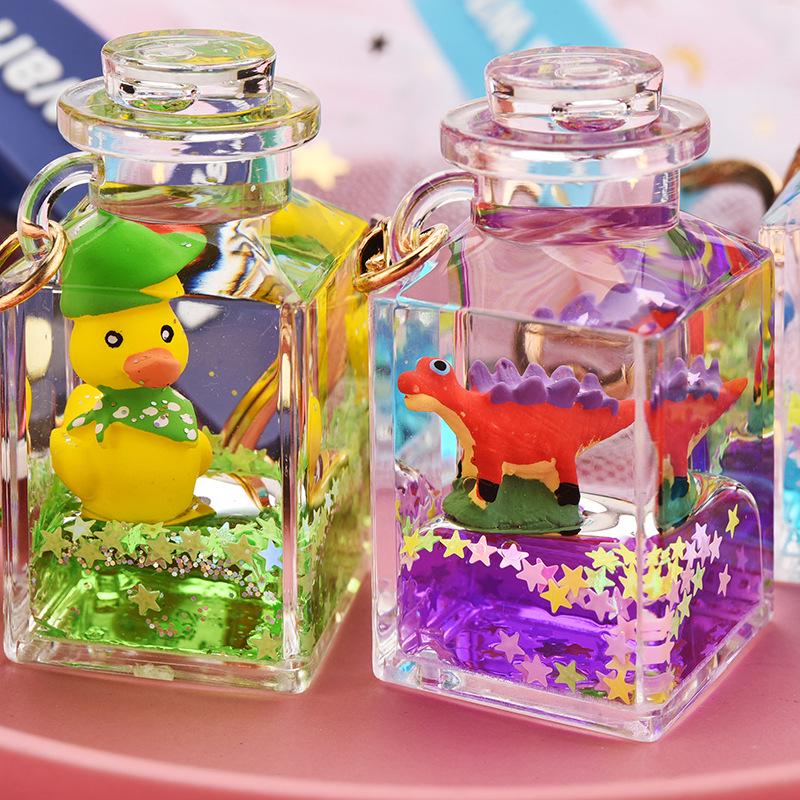 Creative Quicksand Little Yellow Duck Dinosaur Perfume Bottle Backpack Pendant Acrylic Accessory