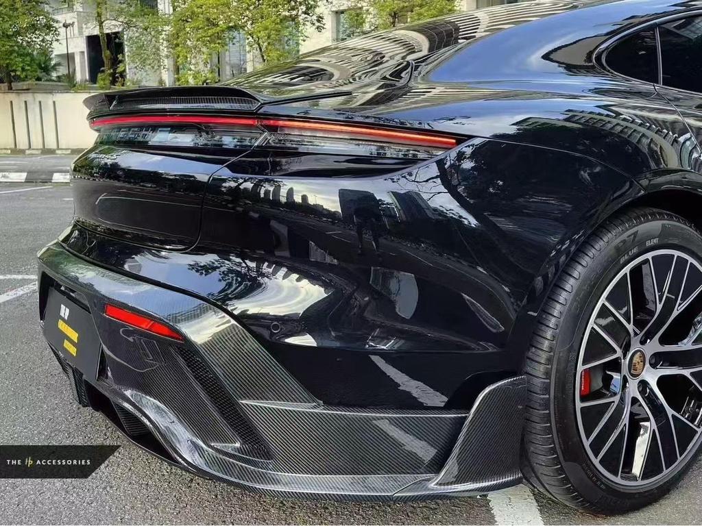 Taycan Mansory-Style Carbon Fiber Body Kit: Front Lip, Side Skirts, Rear Lip, Tail Wing, Wind Deflectors.