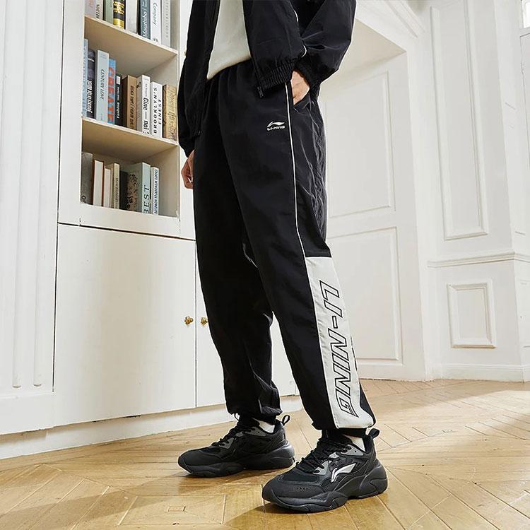 Li-Ning Trendy Colorblock Loose Tapered Knit Sweatpants Men Bottoms Black AYKS837-3