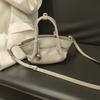 2026 New Leather Vegetable Basket Handbag Women's Niche Design Cloud Dumpling Bag Pendant Shoulder Bag Messenger Bag