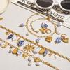 Yori Trendy Stainless Steel Charm Pendant Necklace Earrings Summer 18K Golden PVD Trendy Charm Set Jewelry Wholesale