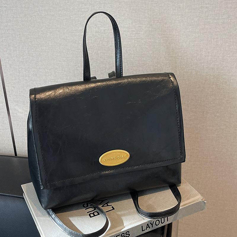 Koreanische Taschen für Damen im Herbst und Winter Neuer Retro Ölwachs Leder College Studenten Klassenrucksack Modische Handtaschen