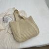 Handwoven Straw Tote Bag Women's Summer Beach Bag with Tassel Detail and Lightweight Design