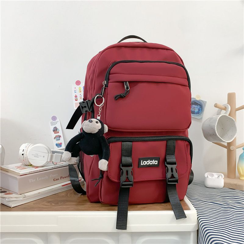 

Schoolbag Boys High School Students Good-looking Large-Capacity Backpack Men s Backpack 2025 New Arrival Student Spine Protection Burden Reduction Red with pendant
