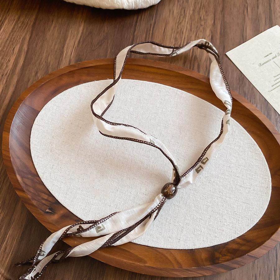 Retro style coffee fabric acrylic love necklace light luxury sweater chain versatile necklace women