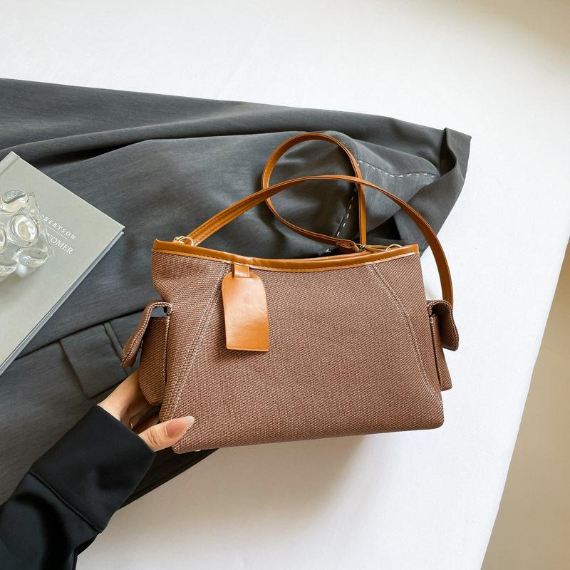 

весна-лето 2025 новая нишевая сумка для поездок на работу, сумка под мышкой, модная универсальная женская повседневная плечевая сумка-мессенджер с контрастными цветами коричневый