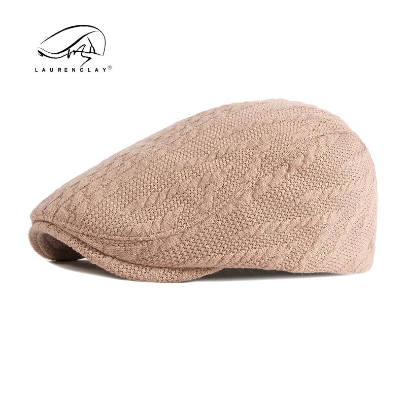 Autumn and winter new knitted wool hat women's British retro beret men's simple light board casual duck tongue forward hat tide