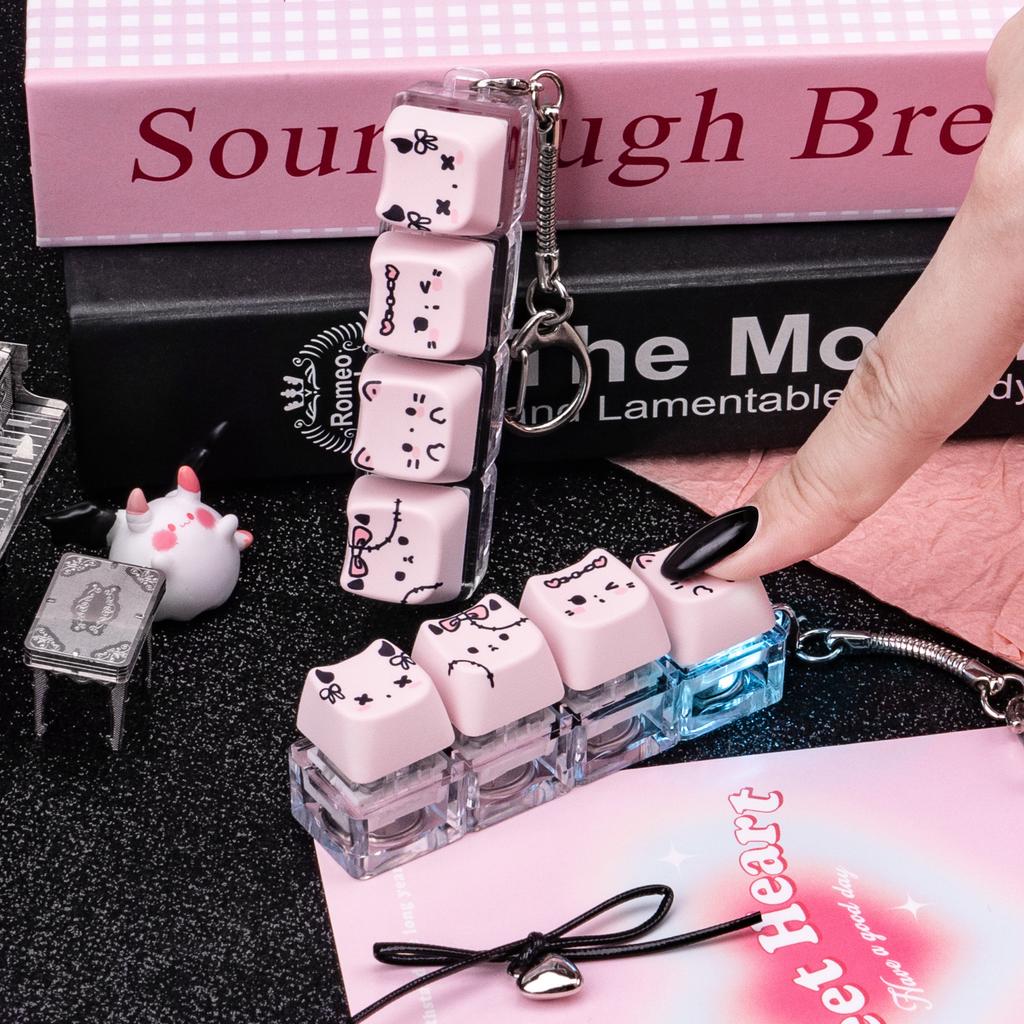 MAIMOOO Keychain Tester Fingertip Toy And Stress Reliever Cute Pink Glowing Cat Mini Keyboard Pendant (Translucent/Opaque).