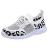 Flying Woven Women's Shoes Spring New Leopard Print Flying Woven Flat-bottomed Mesh Breathable Casual Sports Shoes Women
