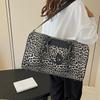 This Is A Niche Hand-held Travel Bag with A Large Capacity and Leopard-print Collapsible Handle