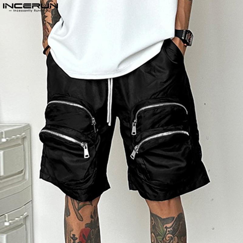 

INCERUN Men Summer Drawstring Elastic Waist Pockets Casual Loose Cargo Pants Shorts 5XL темно-зелений колір