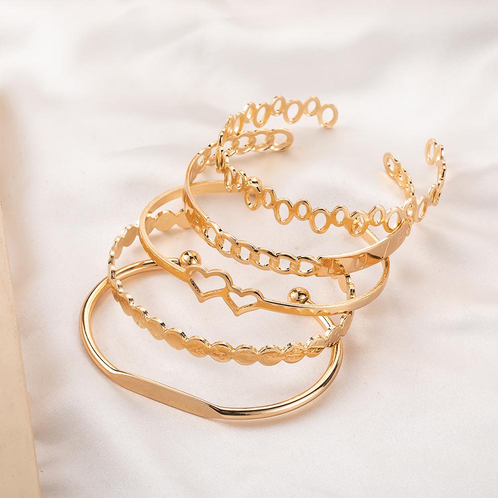 European & American 5-Piece LOVE Bracelet Set: Creative Hollow Bangles with Double Heart Design