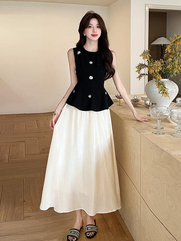 

Chic Summer Sleeveless Black Vest & Waist-Cinching Skirt Set L