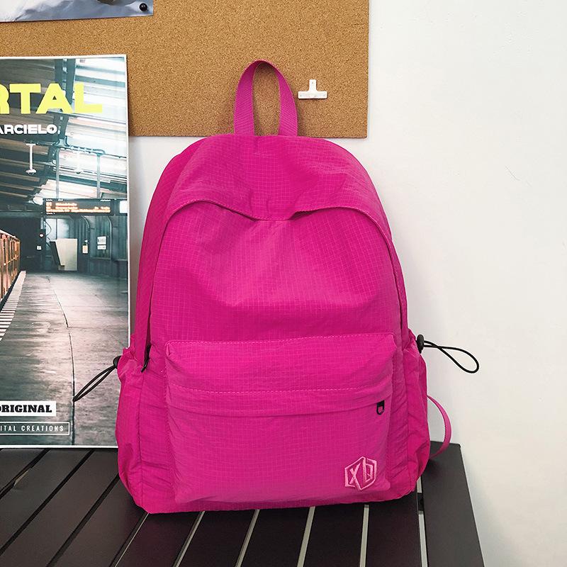 School bag Korean version ins high value backpack early high birth girl casual simple commute versatile large capacity