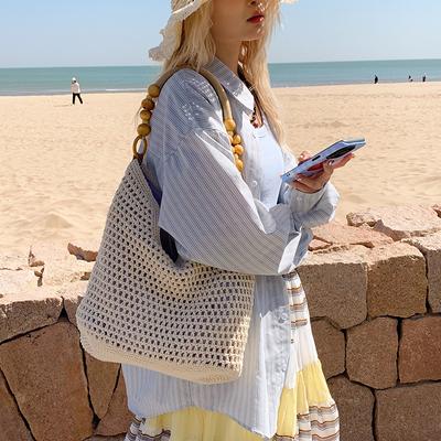 Spring New Seaside Beach Bag Women's Large-capacity Hollow Woven Shoulder Bag Versatile Portable Tote Bag