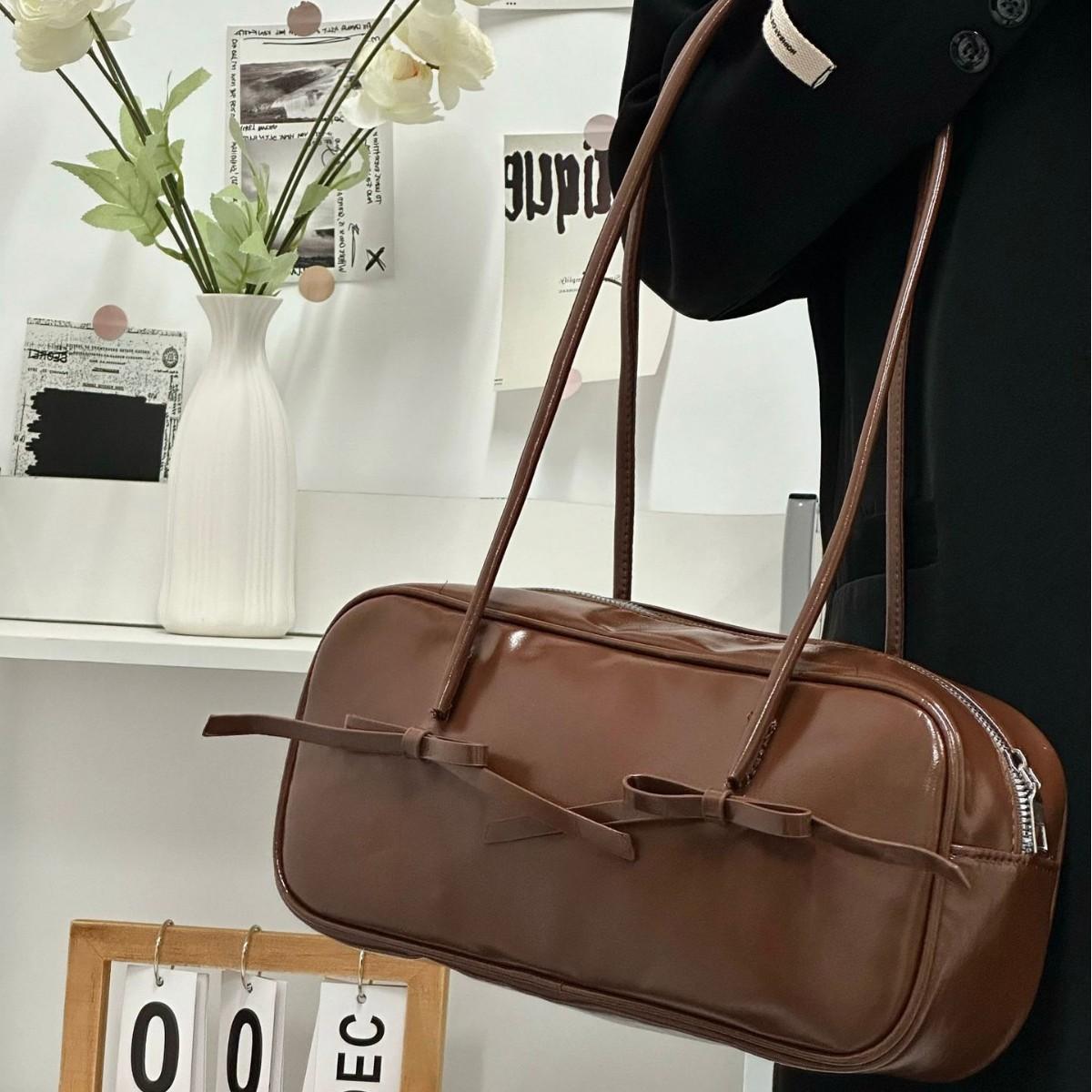 

Underarm Bag Single Shoulder Niche Autumn Winter New Bowknot Bag Women Baguette Bag Fashion Commuting High-end Handbag темно-коричневого