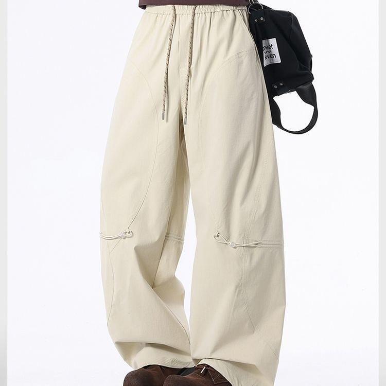 Spring and summer new European and American retro splicing light apricot scimitar loose straight casual pants men's trendy pants