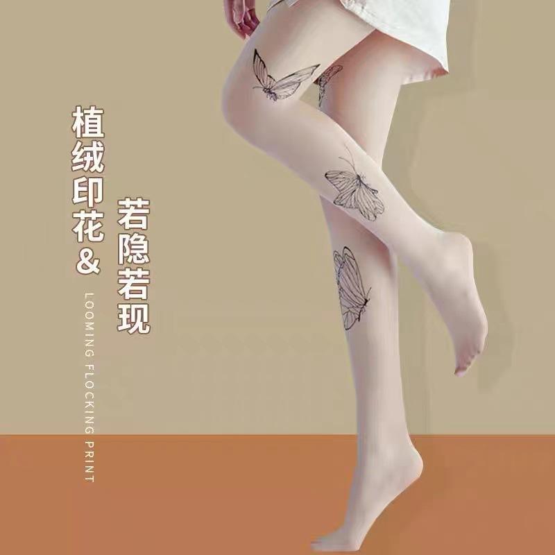 

Flocking printing three butterfly stockings anti-hook silk thin niche white butterfly black silk ultra-thin sexy Internet celebrities one size fits all