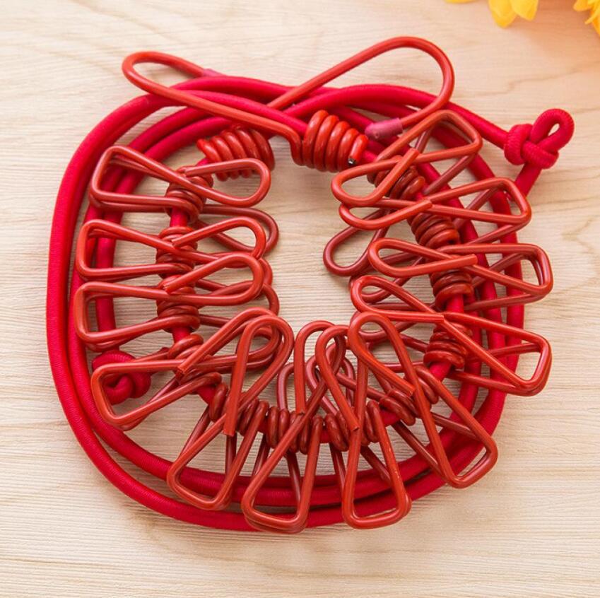 

Красная веревка для белья с зажимом. Товары для дома. Практичные и популярные товары. красный