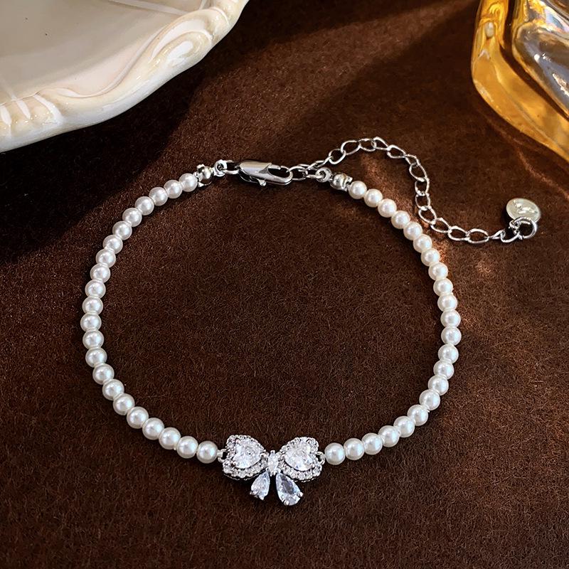 Elegant Pearl & Diamond Beaded Bow Bracelet - Chic, Versatile, and Luxurious Hand Jewelry