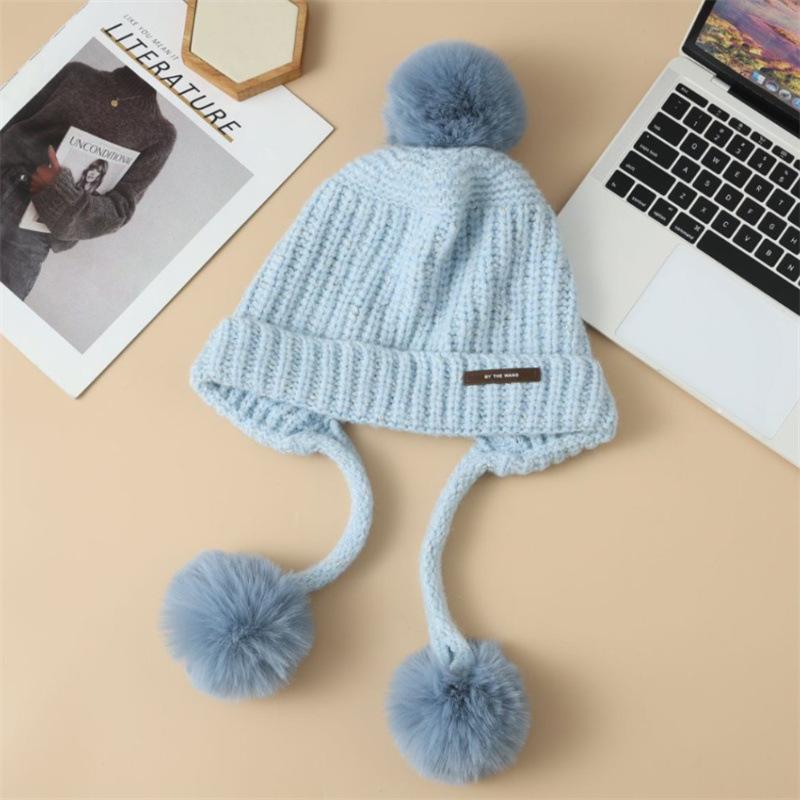 Beanie Hat with Earflap, Stretchy Acrylic Fabric, Adjustable Cap, and Storage Pocket, Hand Wash or Dry Clean