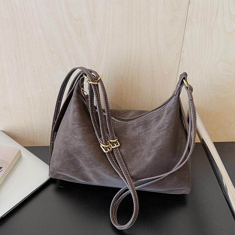 

Korean version niche retro dumpling bag commuter shoulder messenger bag women s 2025 new retro fashion portable tote bag