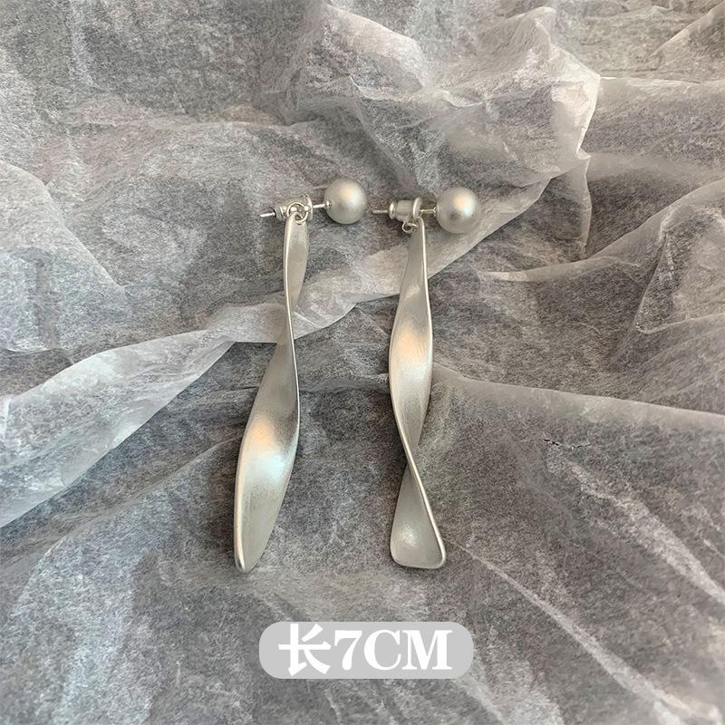 

Corrugated ribbon earrings women s sterling silver long retro niche stud earrings two-wear tassel cold wind metal ear jewelry