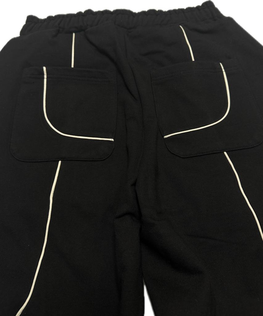 Aseuteleuwoldeu Symbol Logo Two-Tuck Cotton Track Pants (Black)