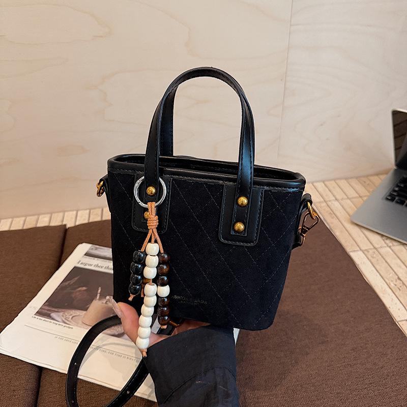 

Korean niche suede bucket bag women s 2025 autumn and winter new versatile shoulder bag premium messenger bag including pendant