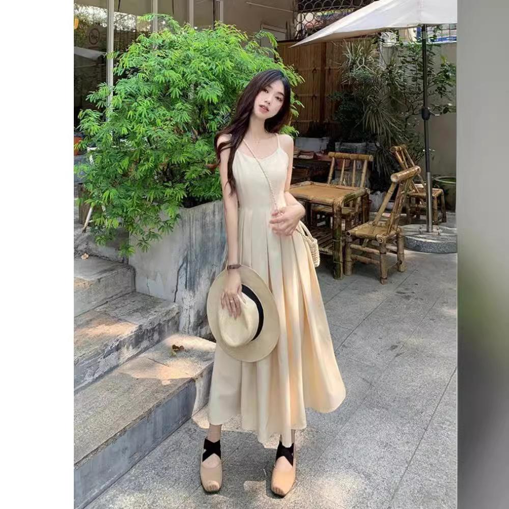 Hepburn style suspender dress summer 2026 new French celebrity temperament waist thin medium and long pleated skirt